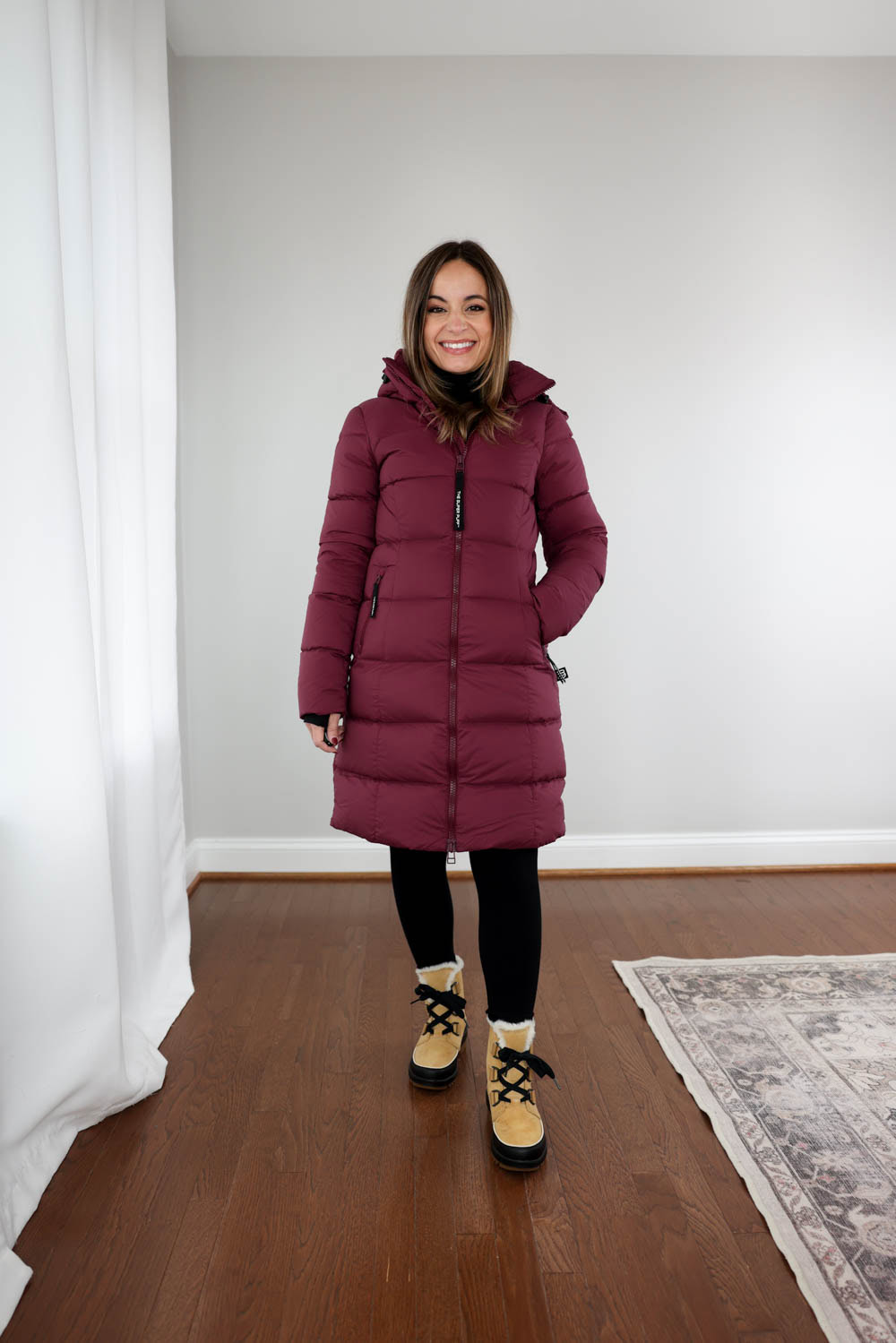 Supersnug Mid Aritzia coat styled by petite fashion blogger Brooke, showing cinched waist and flattering fit.